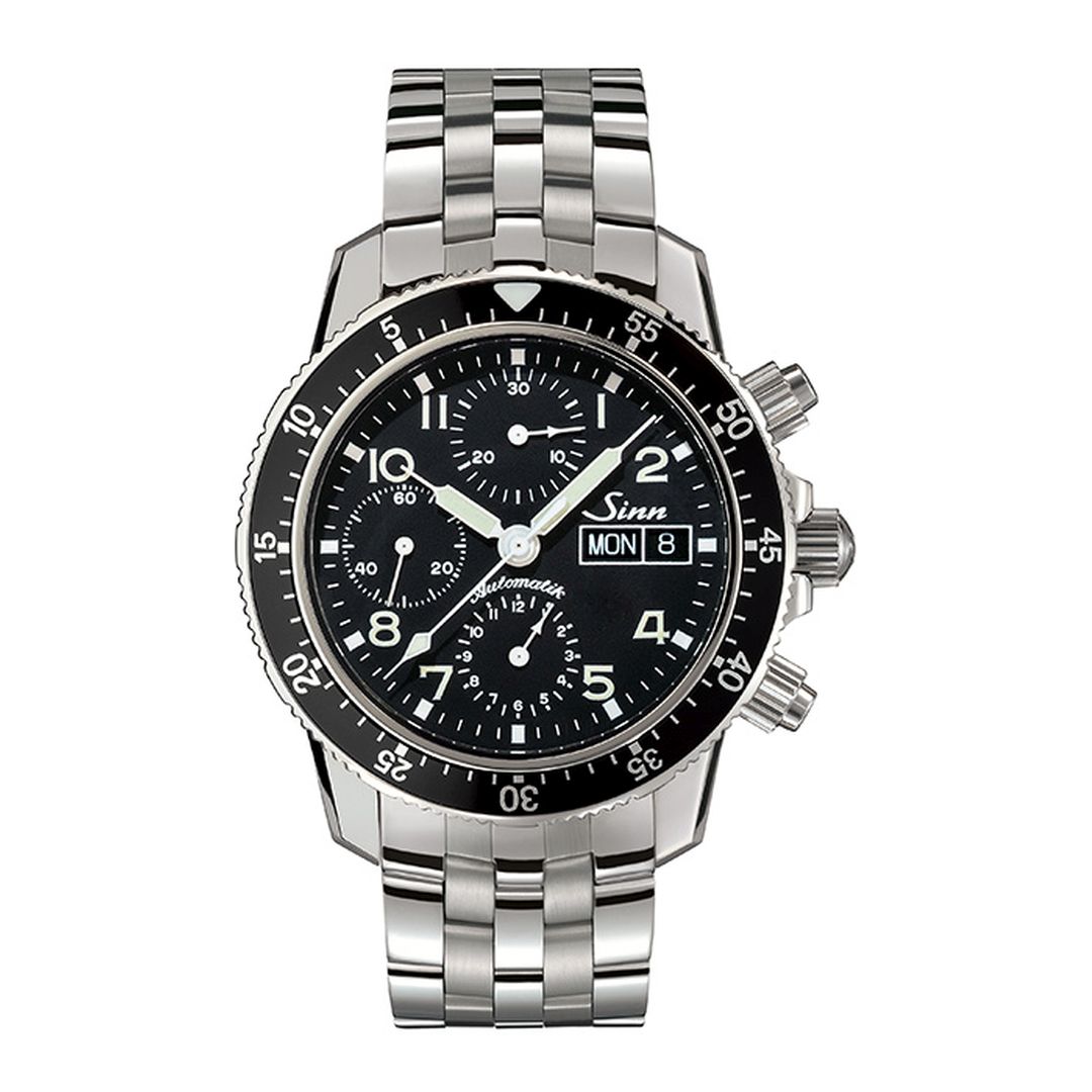 picture of SINN 103 St classic wristwatch, with 41mm stainless steel case and Arabic numerals on the dial, positioned on a metallic surface, emphasizing its sophisticated appearance.