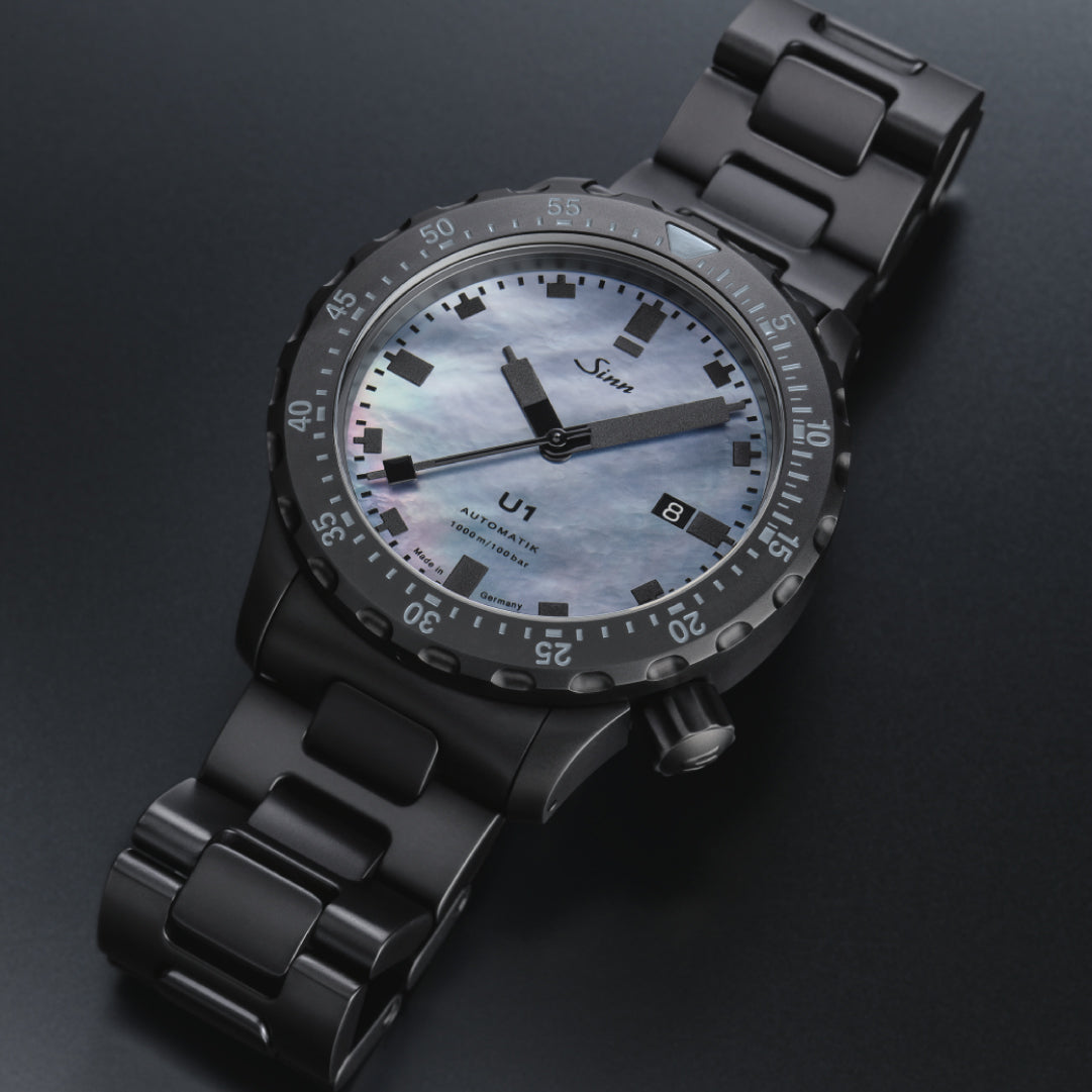 Sinn U1 S Mother-of-Pearl Watch – Dark Mother-of-Pearl Dial | Mother-of-pearl dial, luxury dive watch, iridescent design. 